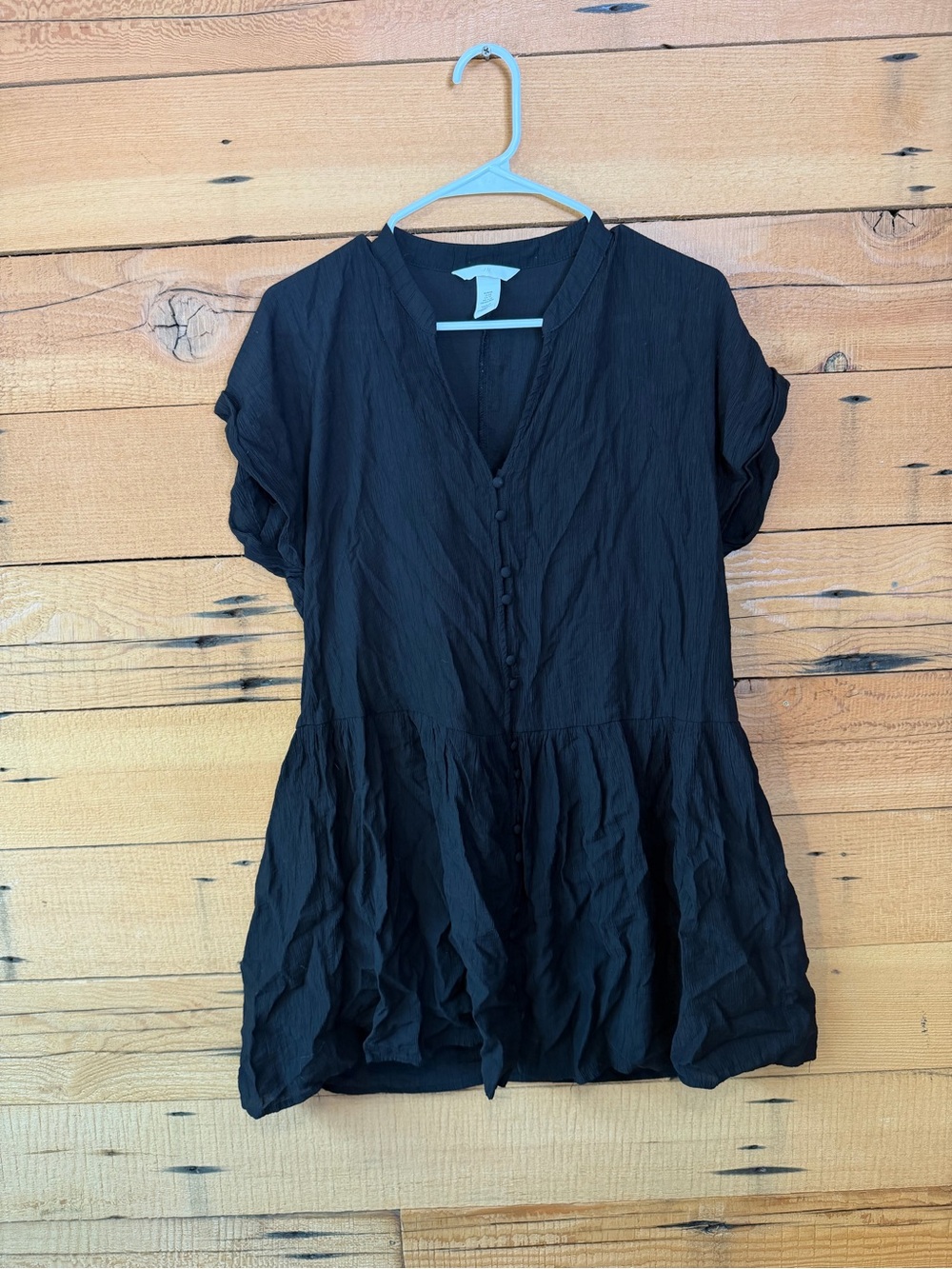 Divided Black Button-Front Peplum Blouse